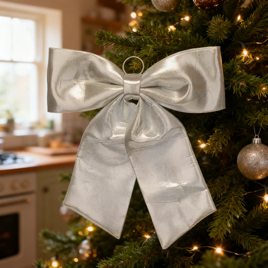 60cm Silver Metallic Fabric Bow in a styled home setting