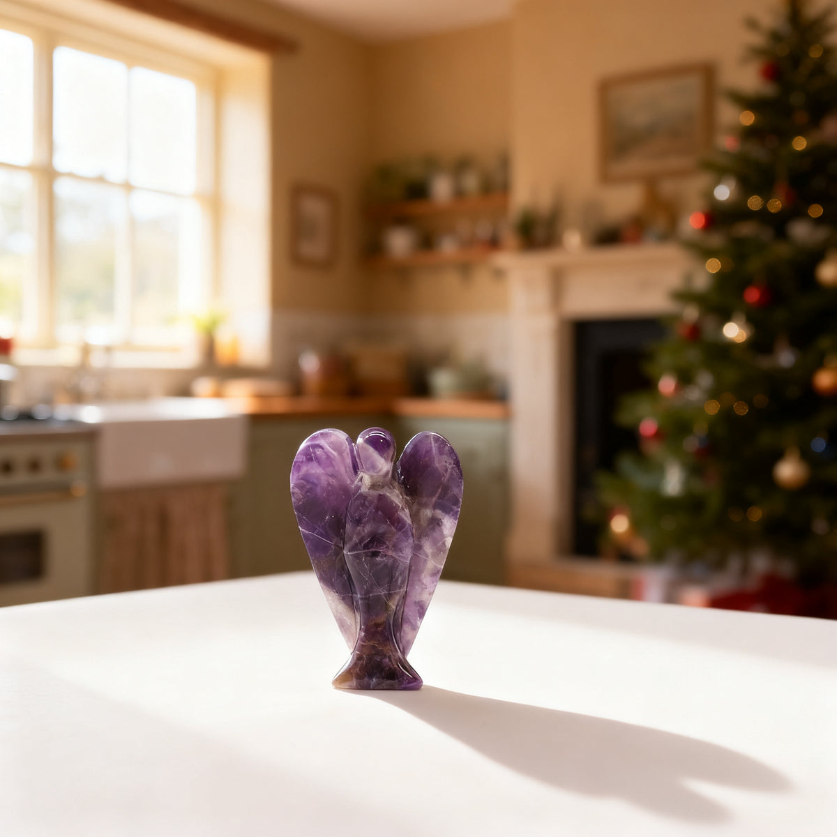 Hand Carved Amethyst Angel in a styled home setting