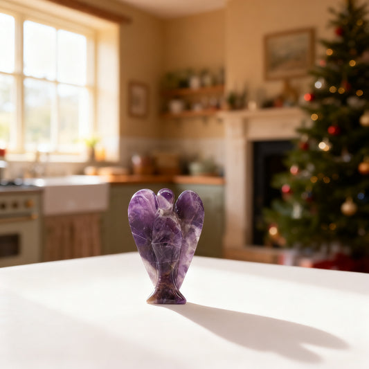 Hand Carved Amethyst Angel in a styled home setting